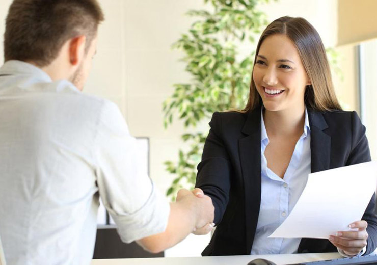 Man and woman shaking hands
